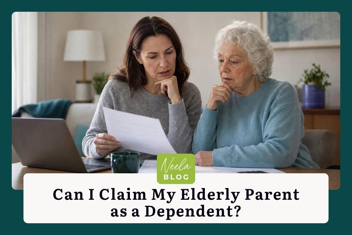 Focused adult daughter and elderly mother reviewing financial paperwork together at a table with a laptop and calculator.