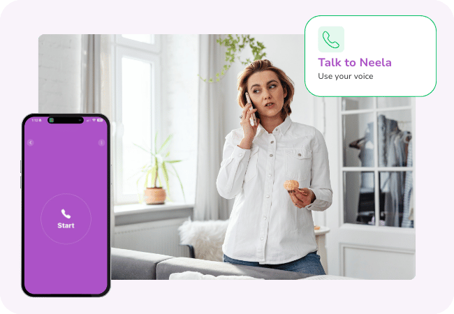 Caregiver completing a household task while speaking to Neela hands-free for support.